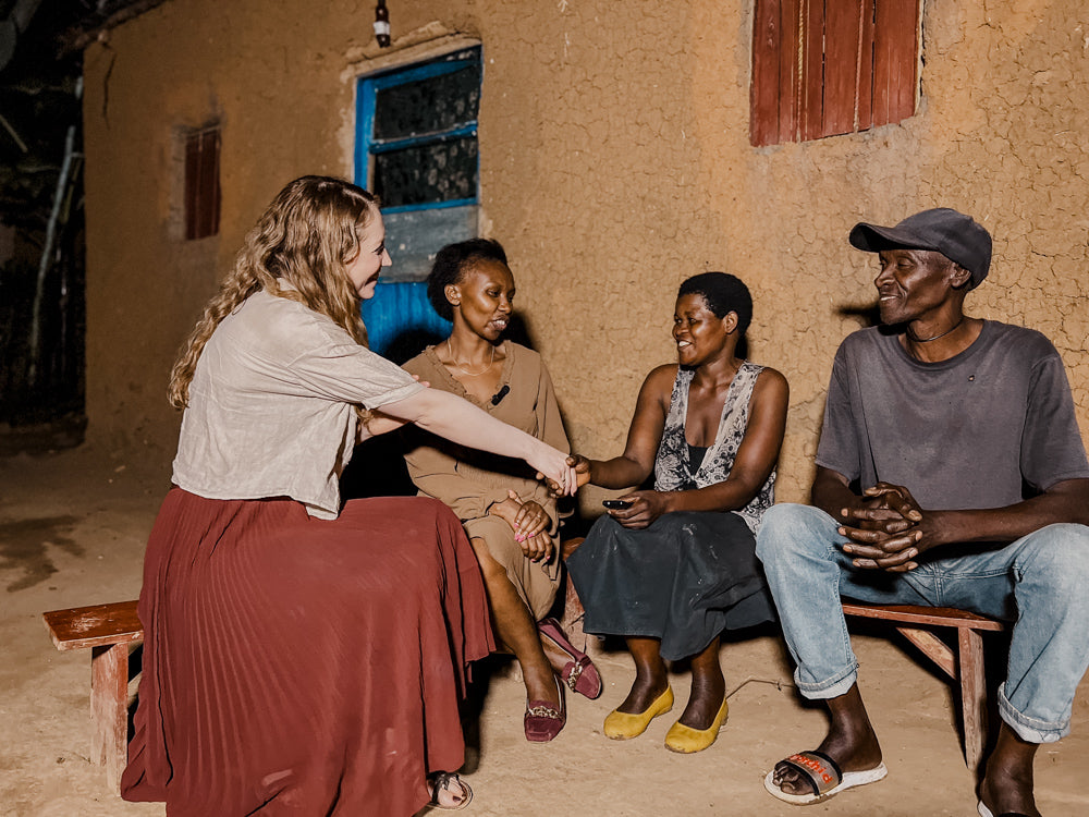 Misiyo founder Sherah (left) and Irere Foundation founder Jackie (next to Sherah) meet a couple that was given health insurance through Misiyo's giveback