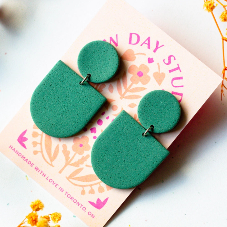 vintage green textured arch earrings made with polymer clay