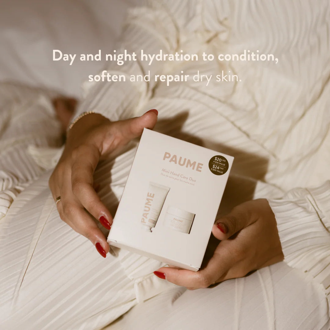 Person holding a PAUME skincare product box with text about skin hydration.