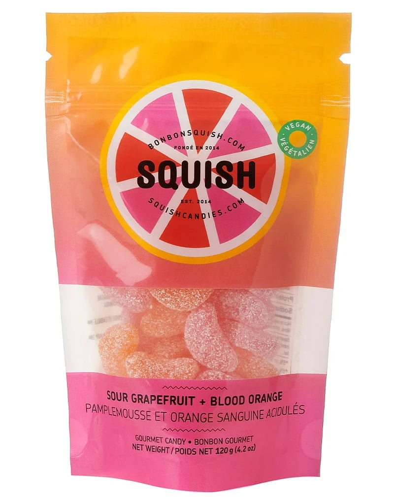 Squish vegan candies bag with sour grapefruit wedges and sour blood orange wedges inside. Gluten free, vegan gourmet candy.