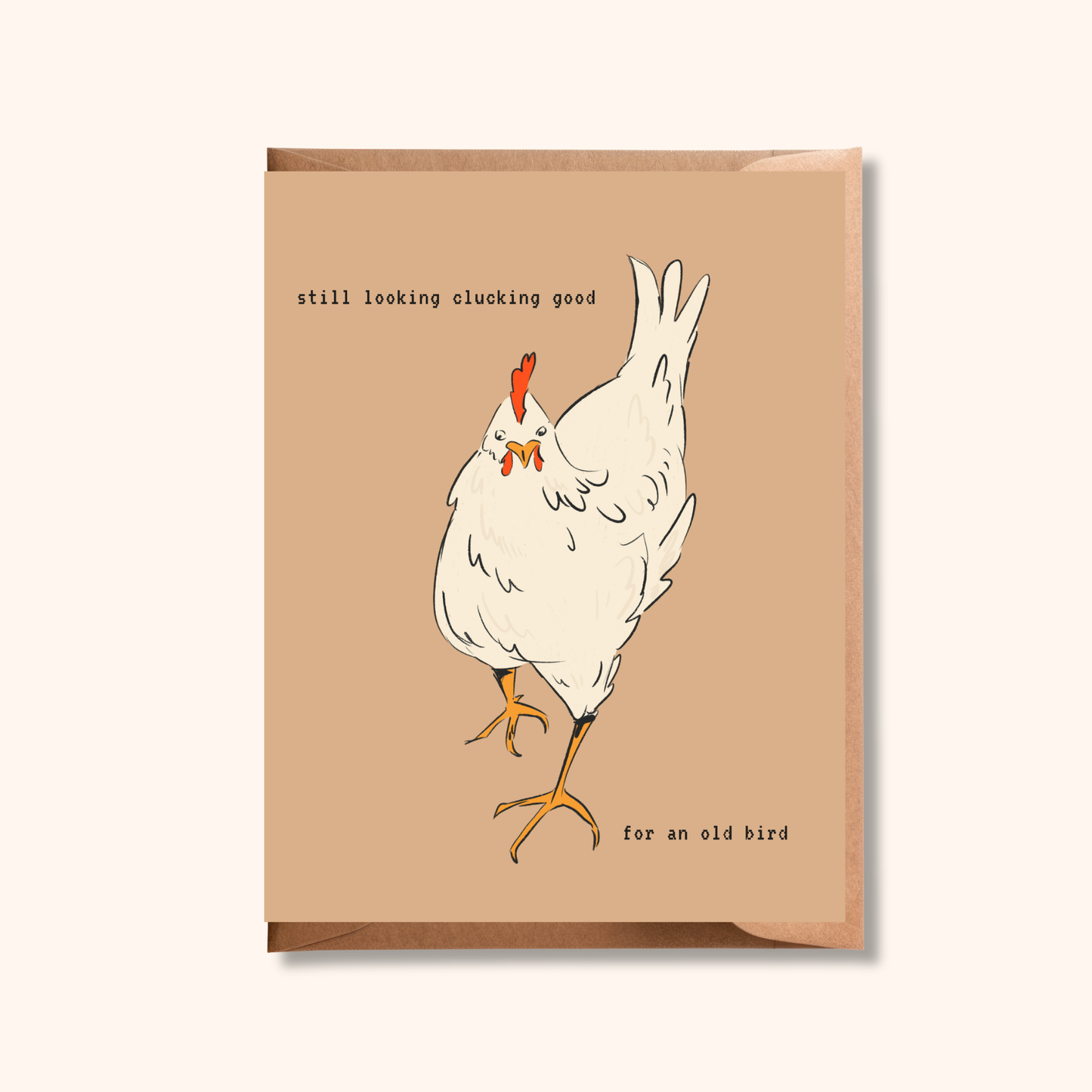 Brush & Bird's Chicken Pun Birthday Card showing a cheeky illustrated white hen on a warm kraft background with the hand-lettered text "still looking clucking good for an old bird," tucked into a matching kraft envelope — a funny birthday card for anyone with a great sense of humour.