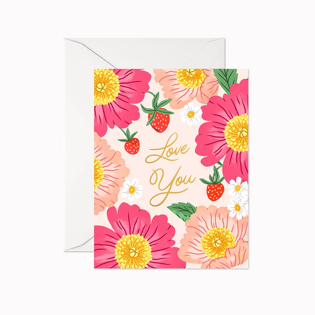 Love You" greeting card by Linden Paper Co., featuring bold pink and peach florals, illustrated strawberries, and gold foil script on a blush background, shown with a white envelope — a sweet gift for someone you adore. Made in Canada.