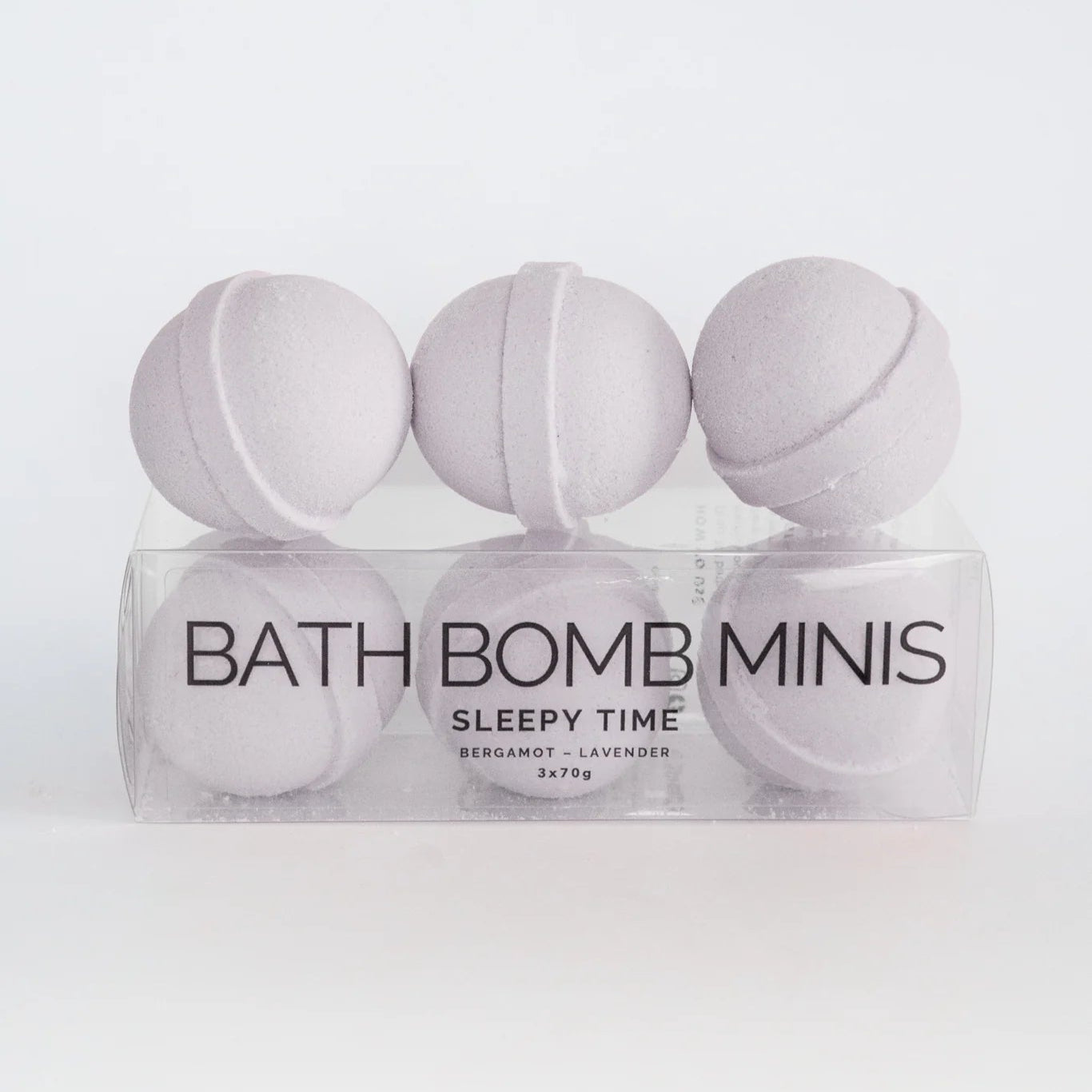 Bath bomb minis in a clear packaging on a white background