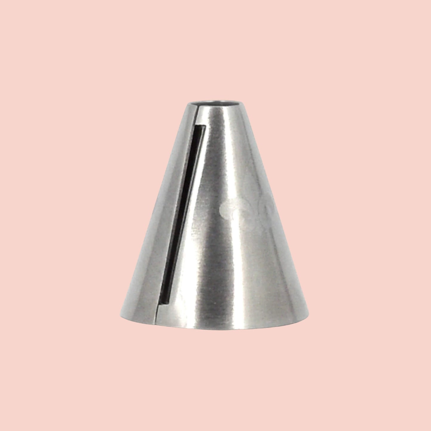 Metallic cone-shaped candlestick shaver tool on a pink background