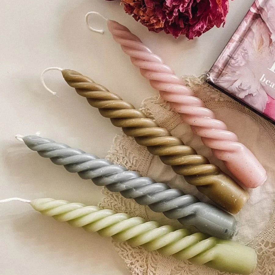 tight spiral beeswax taper candle naturally dyed